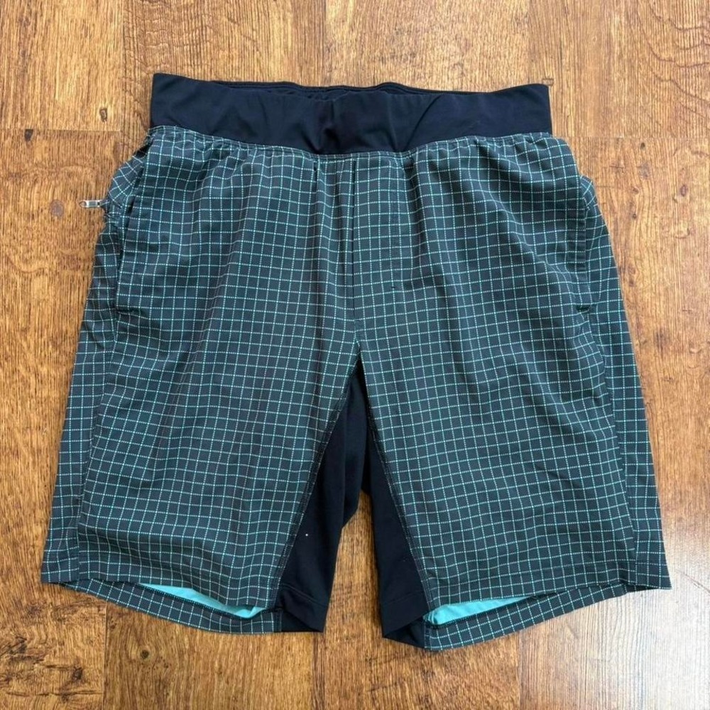 Lululemon lined black and teal grid pattern design workout shorts. size medium.
